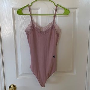 Pink body suit